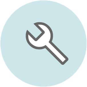 Wrench icon on light blue circular background representing maintenance and repair services.