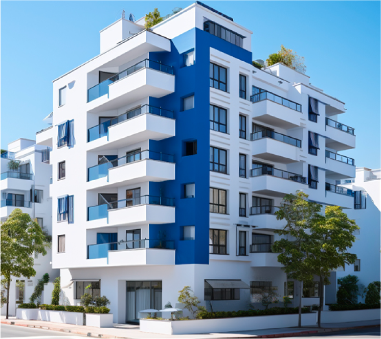 Modern white and blue apartment building with multiple floors and balconies against a clear sky.